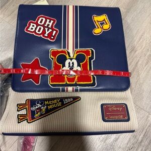Loungefly Navy and Cream Mickey Patch Backpack with Red and Yellow Appliqués